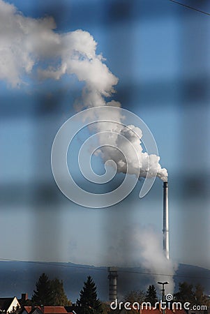 Smoke emitting from an industrial pipe Stock Photo