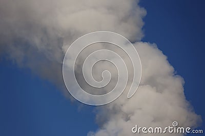 Smoke from a factory chimney releases air pollution and greenhouse gases Stock Photo