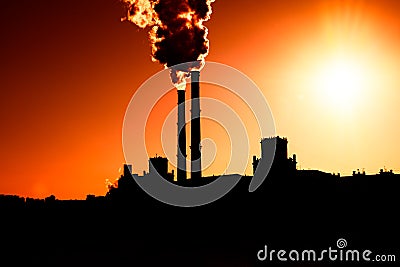 Smoke from factory chimneys silhouette backdrop Stock Photo