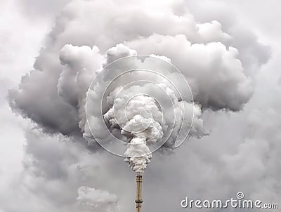 Smoke from factory pipe against overcast sky Stock Photo