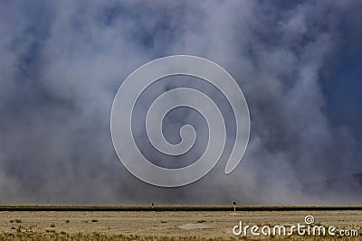 Smoke over runway at Stead Airport in Nevada, USA Stock Photo