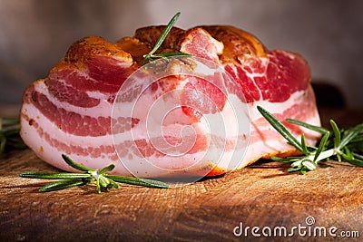 Smoked bacon with rosemary Stock Photo