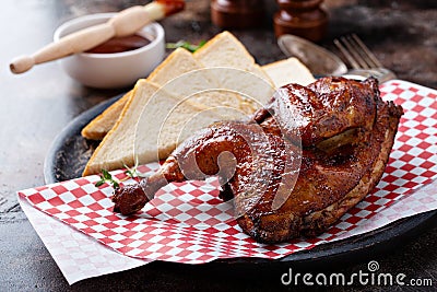 Smoked chicken half with toast Stock Photo