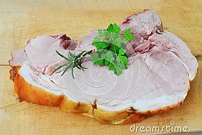 Smoked cured leg ham slice with herbs Stock Photo