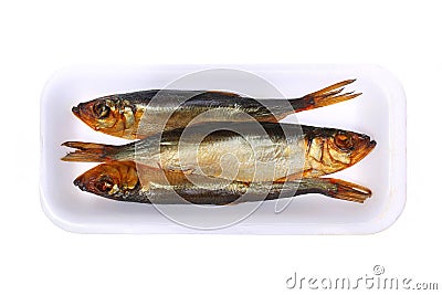 Smoked fish in the plastic plate, isolated Stock Photo