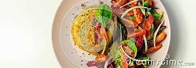 Smoked haddock fishcake with melting cheddar sauce and mixed salad Stock Photo