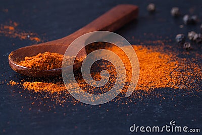 Smoked paprika on spoon and black pepper Stock Photo