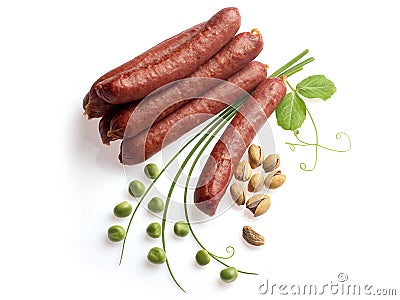 Smoked sausage with onion, green pea and pistachio Stock Photo