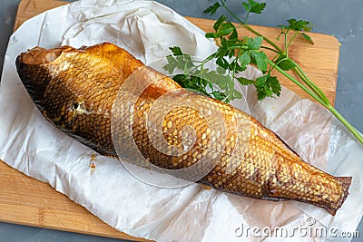 Smoked whitefish on a board Stock Photo