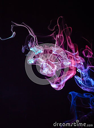 Smokes on black background Stock Photo