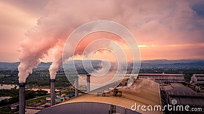 Smokestack pipe factory pollution in the city, Fuel Power Plant Smokestacks Emit Carbon Dioxide Pollution Stock Photo