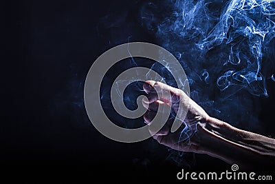 Smoking arm Stock Photo