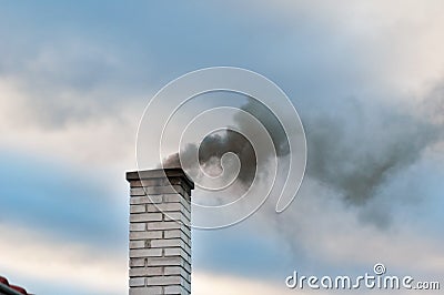 Smoking chimney smoke pollution, small house town Stock Photo