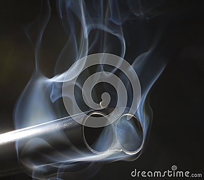 Smoking guns Stock Photo