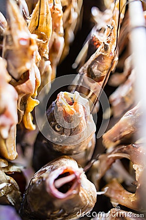 Smoky fish in smokehouse Stock Photo