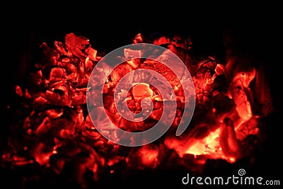 Smoldering ashes of a bonfire Stock Photo