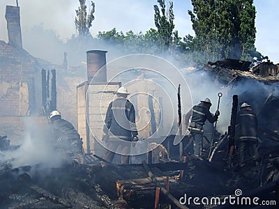 Firefighters extinguish a fire in an apartment house Editorial Stock Photo