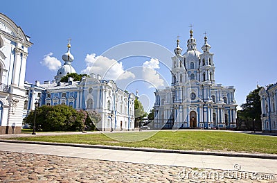 Smolnyi cathedral (Smolny Convent), St. Petersburg, through the square of Proletarian dictatorship. Russia Stock Photo