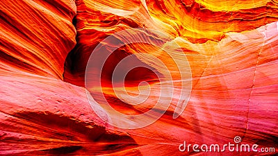 The smooth curved Red Sandstone walls caused by water erosion in Mountain Sheep Canyon Stock Photo