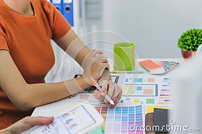 Smooth Focus, group of web designers are working together to develop mobile responsive website with UI UX Front End Designer Stock Photo