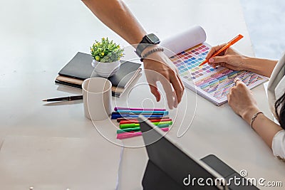 Smooth Focus, group of web designers are working together to develop mobile responsive website with UI UX Front End Designer Stock Photo