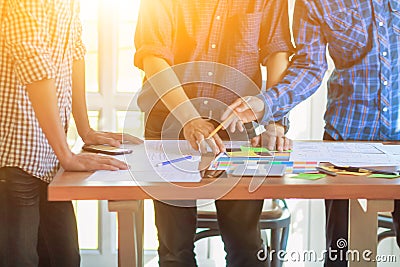 Smooth Focus, group of web designers are working together to develop mobile responsive website with UI UX Front End Designer Stock Photo