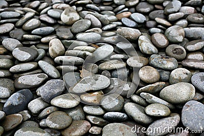 Smooth, round ocean rocks Stock Photo