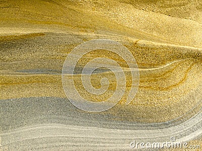 Smooth surface of layered sandstone sediment rock Stock Photo