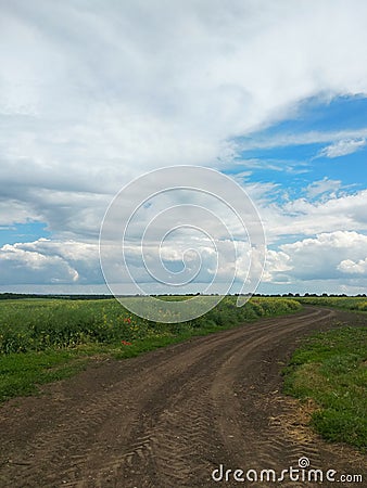 Smooth turn of dirt road Stock Photo