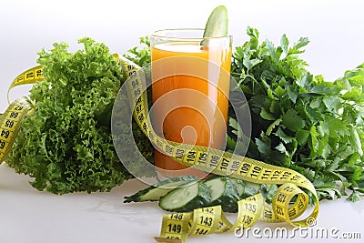 Smoothie of cucumber and bell pepper and measuring tape Stock Photo