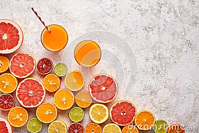 Smoothie or fresh juice vitamin in citrus fruits background flat lay, helthy beverage Stock Photo