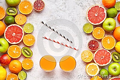 Smoothie or fresh juice vitamin drink in citrus fruits background flat lay, helthy vegetarian organic antioxidant detox Stock Photo