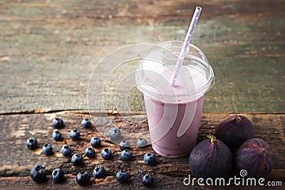 Smoothie in plastic cup Stock Photo