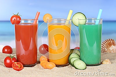 Smoothie vegetable tomato juice with vegetables on the beach Stock Photo