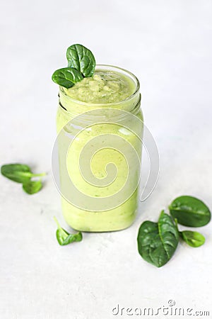 Smoothies with banana, avocado, spinach, lime Stock Photo