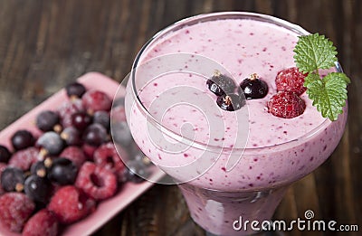 Smoothies of frozen raspberries and black currant . Stock Photo