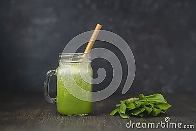 Smoothies from wild leek, honey and banana in a glass mug, close up Stock Photo