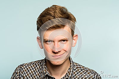 Smug smile man self satisfied smirk expression Stock Photo