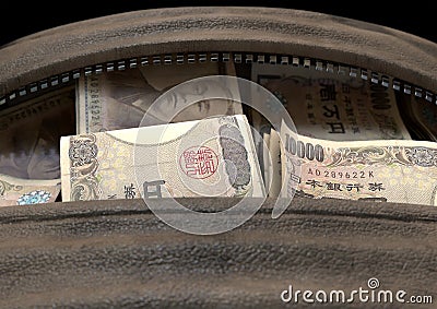 Illicit Cash In A Brown Duffel Bag Stock Photo