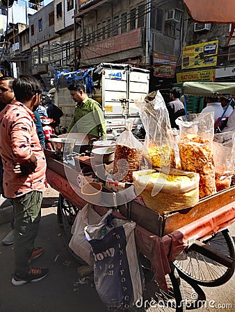 Snack seller in Chandni Chowk, Old Delhi. Editorial Stock Photo