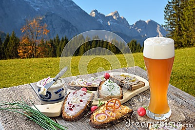 Snack with spreads in the Bavarian Alps Stock Photo