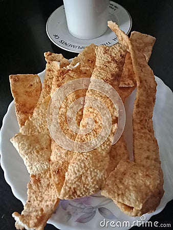 Snacks made of cassava flour with salt, onion and chilies to accompany coffee. Stock Photo