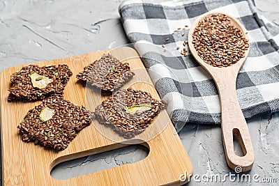 Snacks made from flax seeds and dried fruits. healthy ingredients. close up Stock Photo
