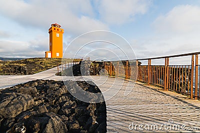 SNAEFELLSNES, ICELAND - AUGUST 2018: view over orange tower of Svortuloft Lighthouse Editorial Stock Photo