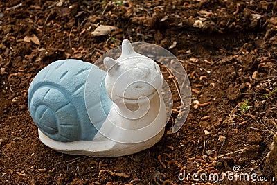 Snail garden gnome, figure Stock Photo