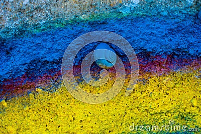 snail painted on a wall with many colors. Stock Photo