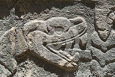 Snake carved relief detail symbol in Chichen Itza ruins Stock Photo