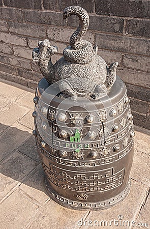 Snake-dragon trash can on top of Huancheng city Wall, Xian, China Editorial Stock Photo