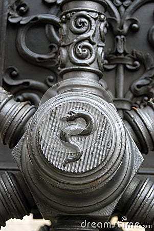 A snake. Old cannon detail. Stock Photo