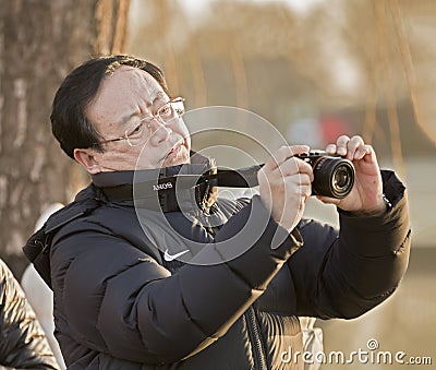 Snap portrait of a photographer Editorial Stock Photo